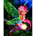 Kit complet diamond painting fée ailes vertes 30 par 40cm. Diamants ronds