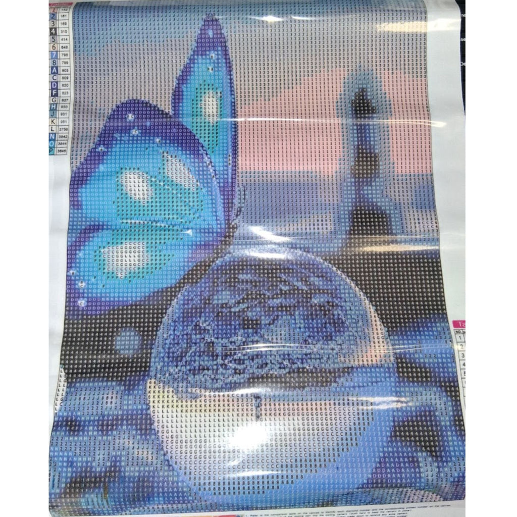 Kit diamond painting papillons bleus château glace 30 par 40cm. Diamants ronds